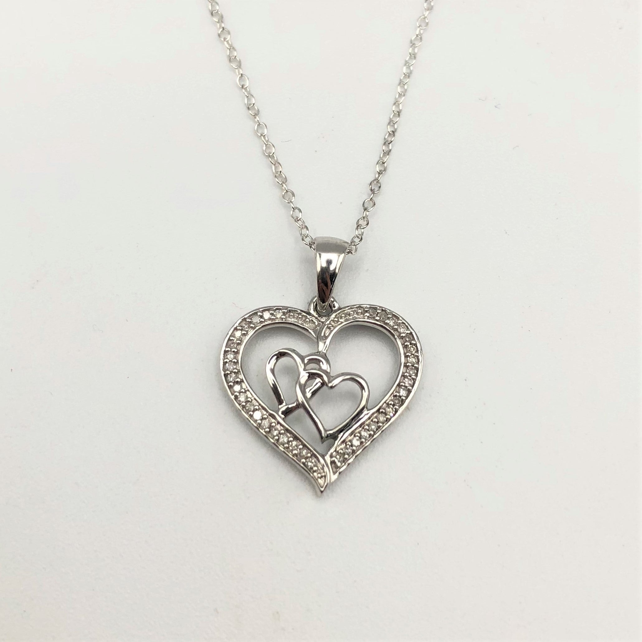 Sterling Silver 1/8 Carat TW Diamond Heart Pendant Necklace - Le Vive Jewelry in Riverside